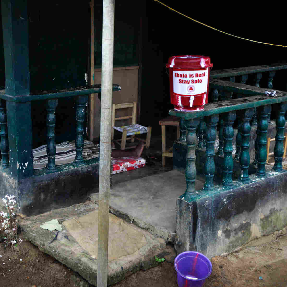 The home of Marthalene Williams, the Ebola-stricken woman aided by Thomas Eric Duncan. A man on the porch, who appeared to be in the late stages of Ebola, informed our photographer that he'd been to a hospital but was told to return home and quarantine himself.