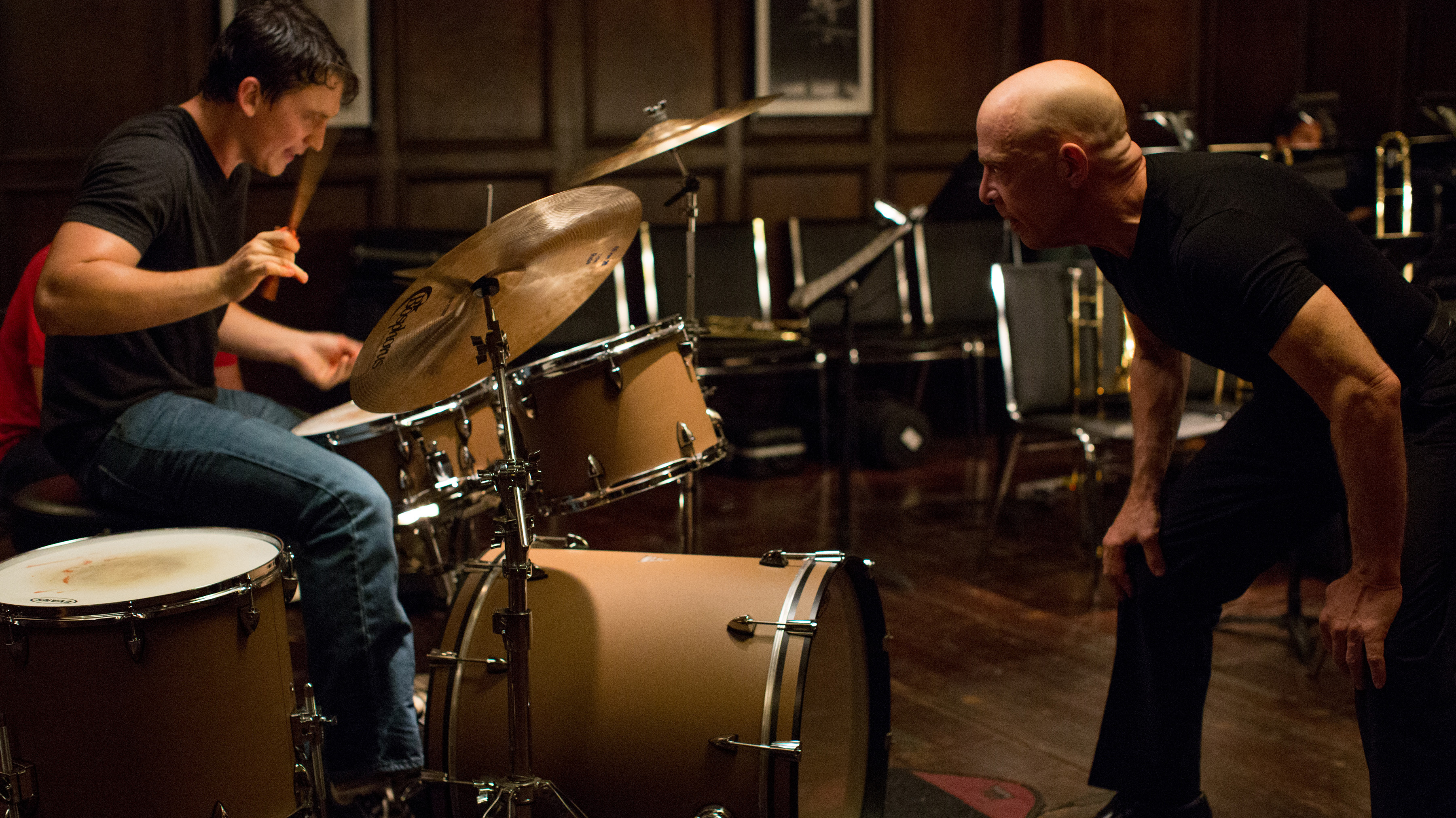 Miles Teller and J.K. Simmons face off in Damien Chazelle's impressive drumming-as-sport film, <em>Whiplash</em>. (Sony Pictures Classics)