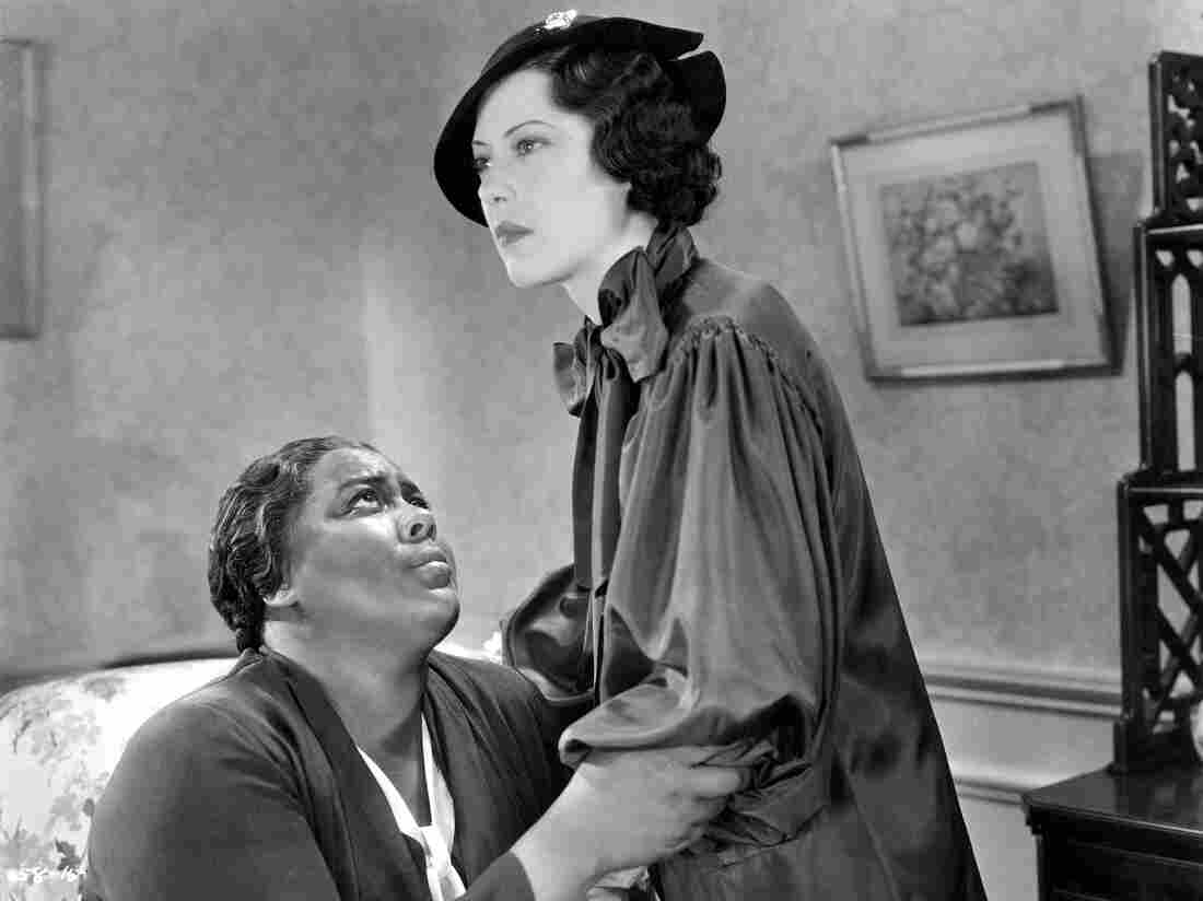 In the 1934 film Imitation of Life, Fredi Washington (right) plays the role of Peola, an African-American woman who decides to pass as white.