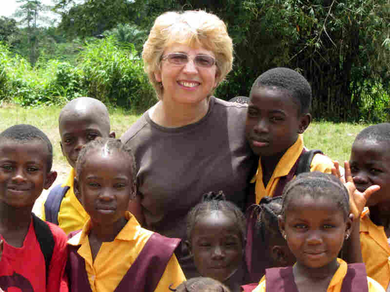 Nancy Writebol, poses with children in Liberia. Nancy Writebol is one of two Americans working for a missionary group in Liberia who were infected with the Ebola virus, and who have been receiving treatment at Emory University Hospital, in Atlanta.