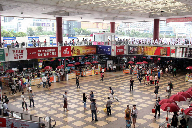Kiosks in this mall in the Chinese city of Zhuhai specialize in moving large sums of money from the mainland into Macau, evading China's strict currency controls.