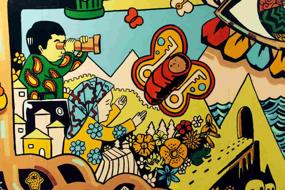 A mural created by students, with help from the artist Angel Garcia, in the hallway at Flushing International High School in New York City.