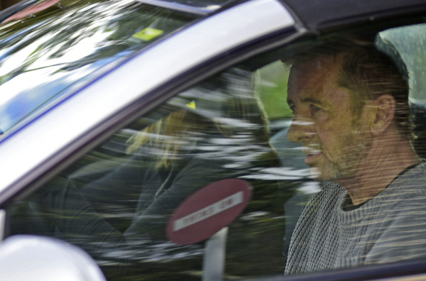 Phil Rudd, the drummer for rock band AC/DC, leaves a court house in Tauranga, New Zealand, on Thursday.
