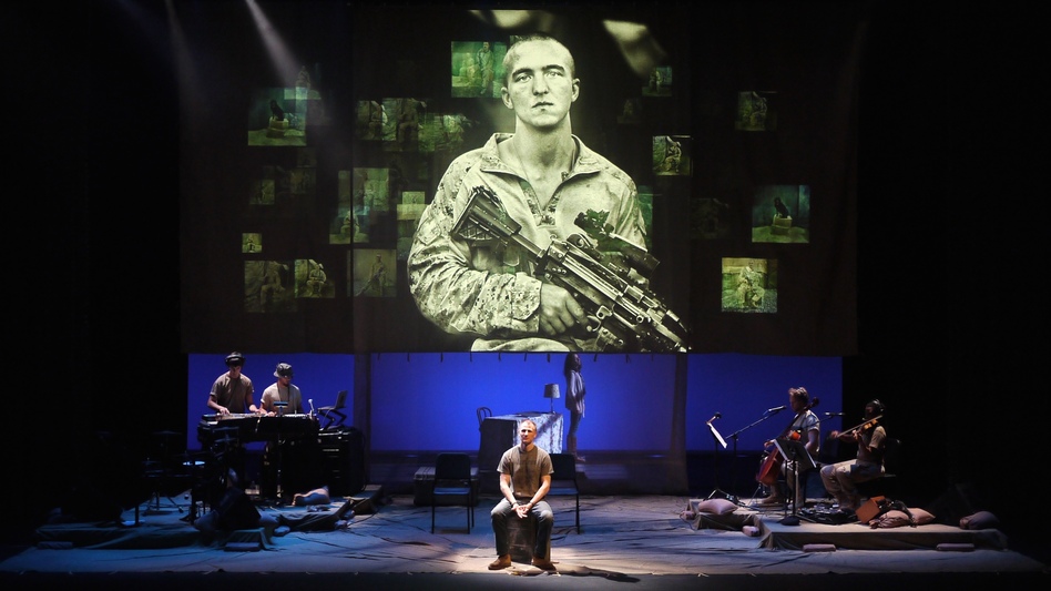 <em>BASETRACK Live</em> incorporates photographs, videos and interviews to tell the story of warfare, both at home and abroad. (Courtesy of En Garde Arts)