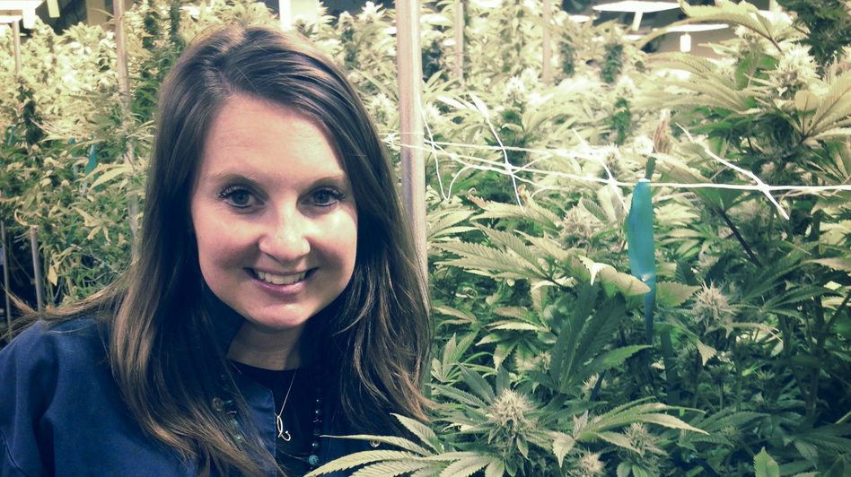 Brooke Gehring, CEO of Patients Choice and Live Green Cannabis, stands in one of her company's grow houses in Denver. (Kirk Siegler/NPR)