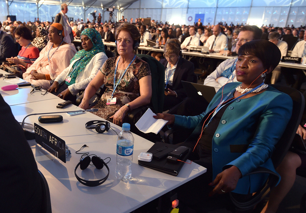 Country representatives listen to opening remarks at the start of the United Nations' Conference of the Parties on Climate Change in Lima, Peru.