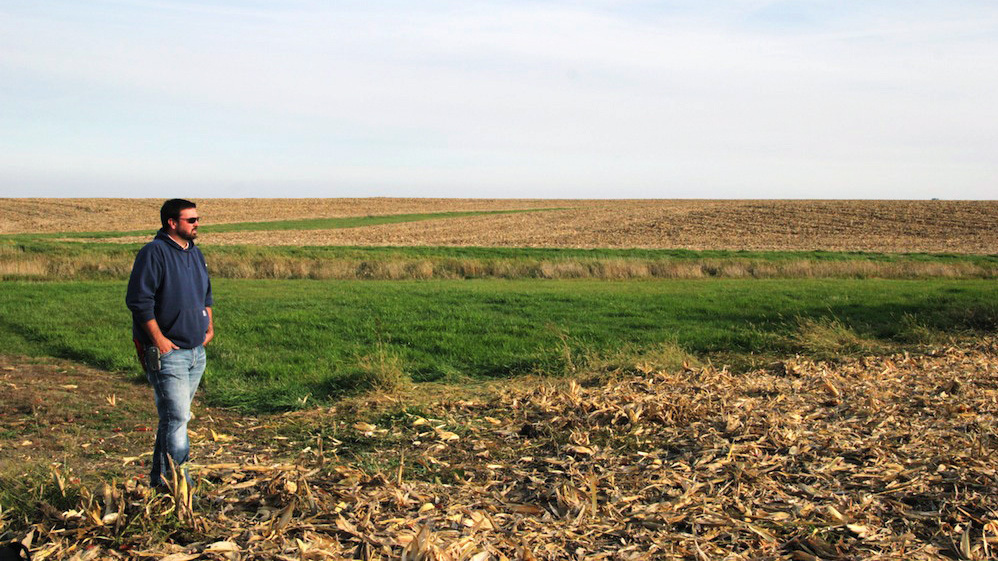 Like many beginning farmers, Grant Curtis wants to invest in his operation, but expectations of low prices are tying his hands. (Harvest Public Media)