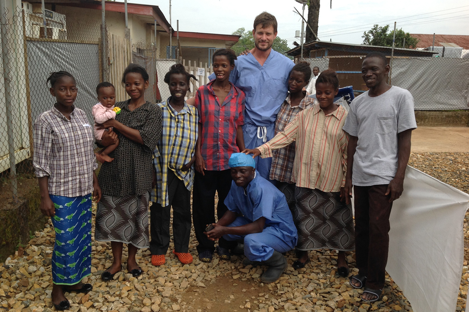 Dr. Ian Crozier stands with a group of survivors and a nurse at the Kenema Government Hospital in Sierra Leone. He contracted Ebola and was on the brink of death, but he survived.