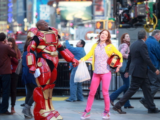 Actors Tituss Burgess and Ellie Kemper horse around on the set of <em>The Unbreakable Kimmy Schmidt</em> while filming in New York in March. Tina Fey's new TV series<em> </em>was developed for NBC, but will air on Netflix instead. (GC Images)