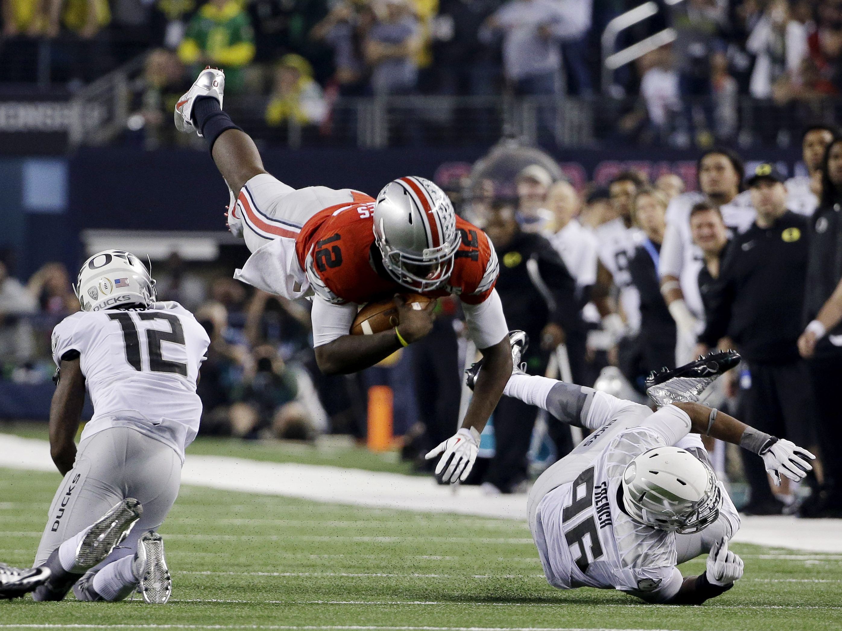 Ohio State quarterback Cardale Jones dives for a first down during the second half of Monday night's game.
