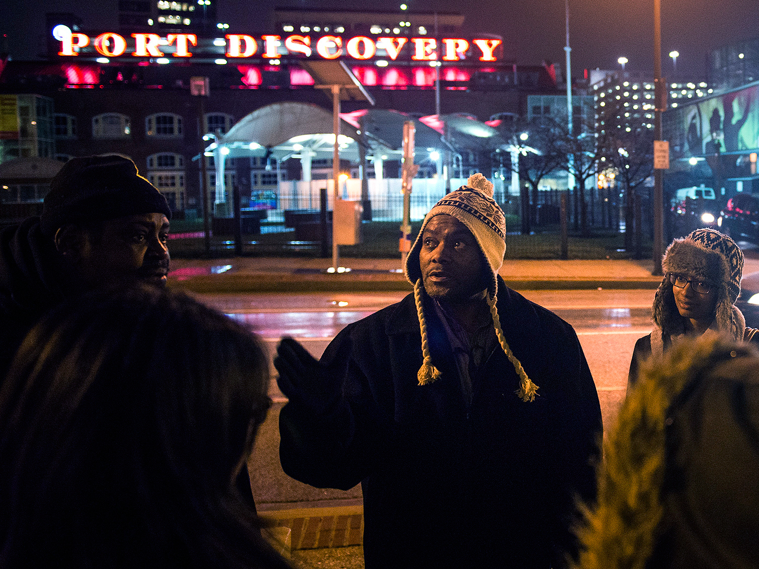 Tony Simmons leads a group of Johns Hopkins University students on a &quot;justice walk&quot; in downtown Baltimore, during which they learn about public policy, providing services, and the connections between income inequality and health. (Gabriella Demczuk for NPR)