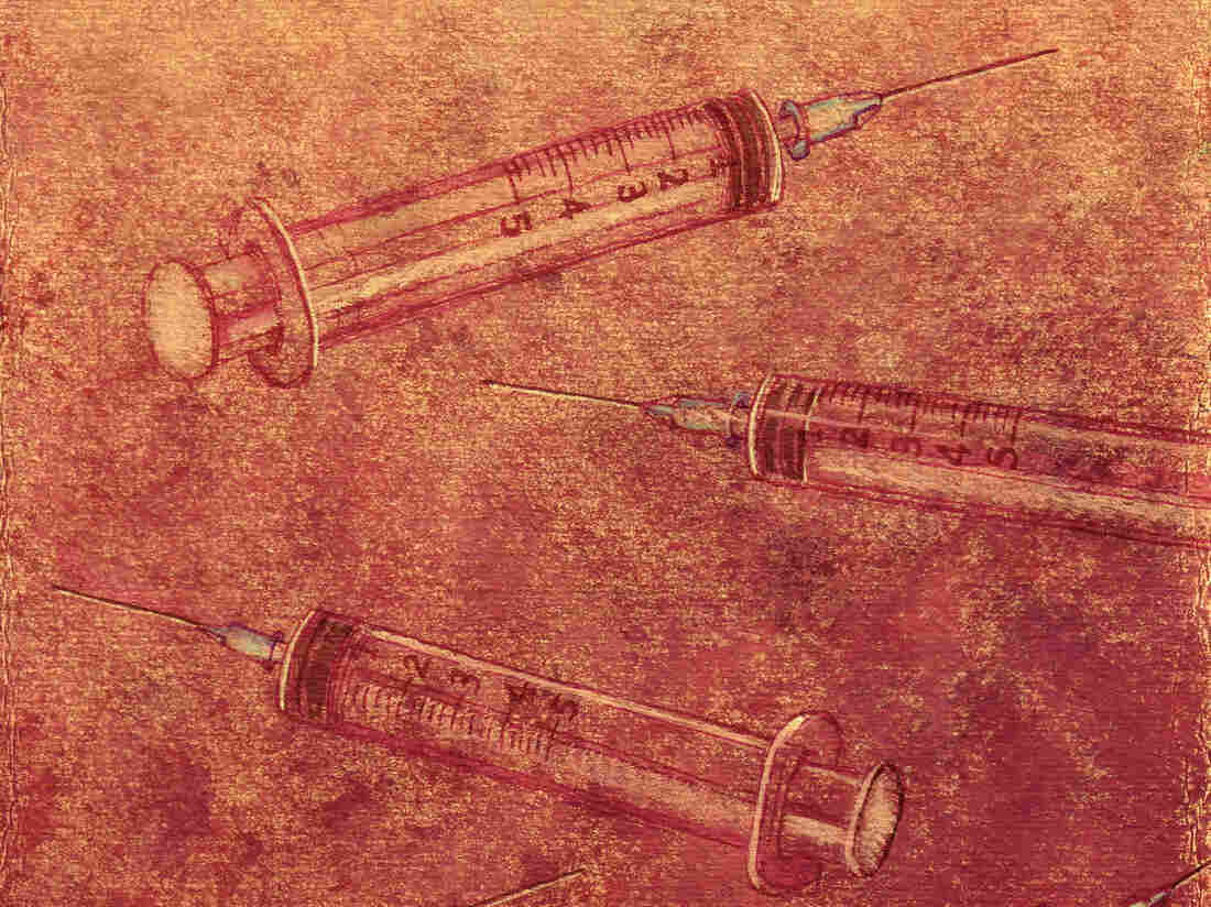 An illustration of syringes.