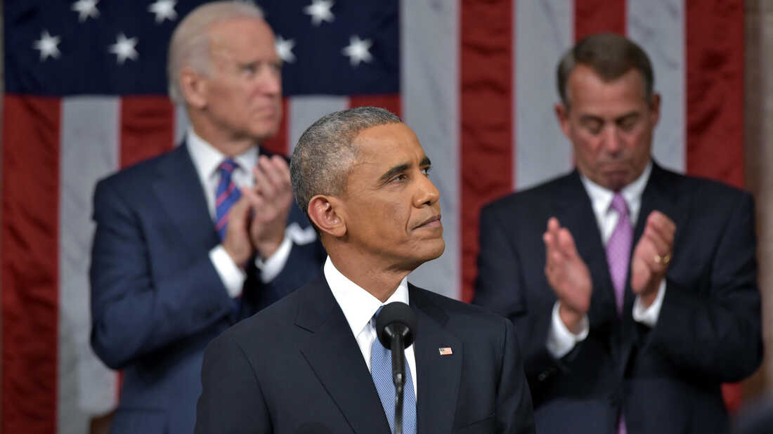 Vice President Joe Biden and House Speaker John Boehner applaud while President Barack Obama arrives to deliver his State of the Union address to a joint session of Congress Tuesday night.