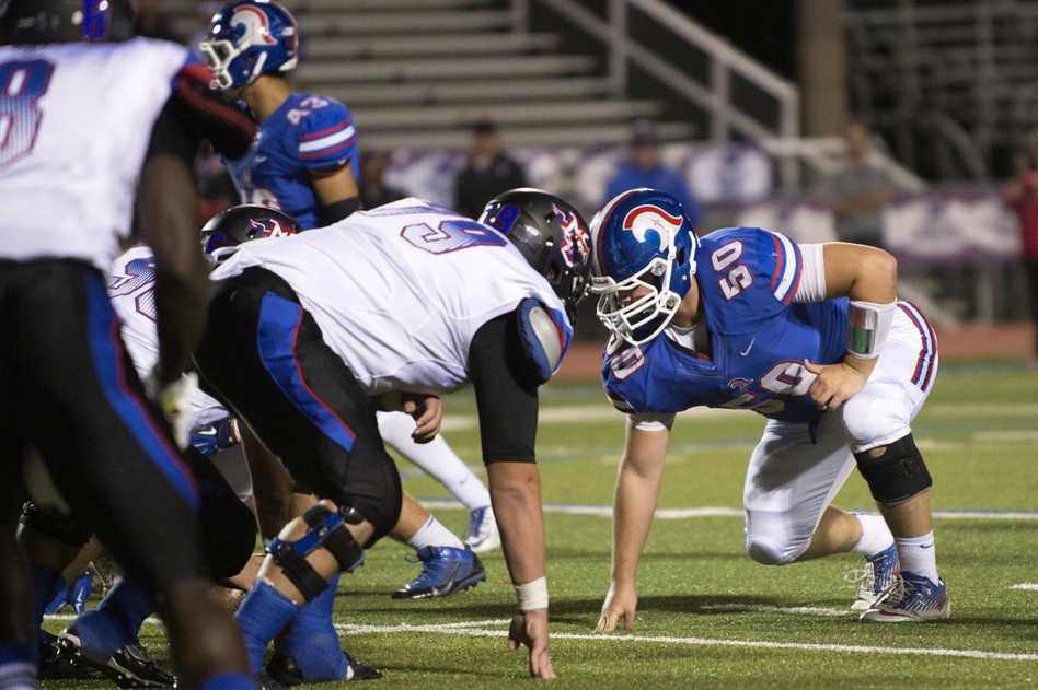 High school athlete Graham Hill, number 50, suffered a concussion in 2013 while playing football at Trinity Christian Academy in Addison, Texas. (Courtesy of Jeffrey McWhorter)
