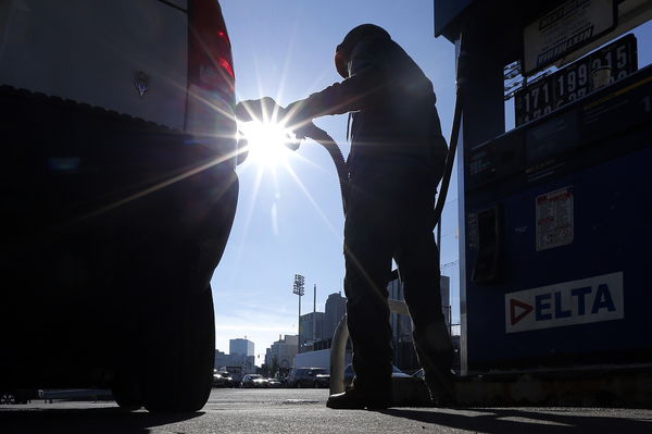 With gas prices continuing to fall, most drivers are pocketing some savings. But for people who regularly drive long distances, low fuel costs are a particular boon to the pocketbook.