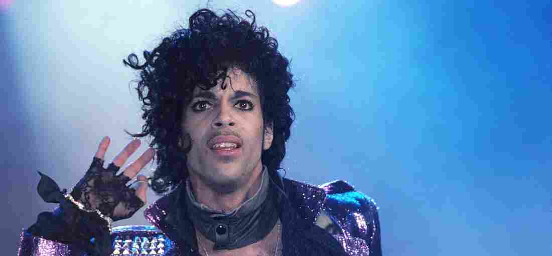 Prince performs on stage during the Purple Rain tour in 1984.