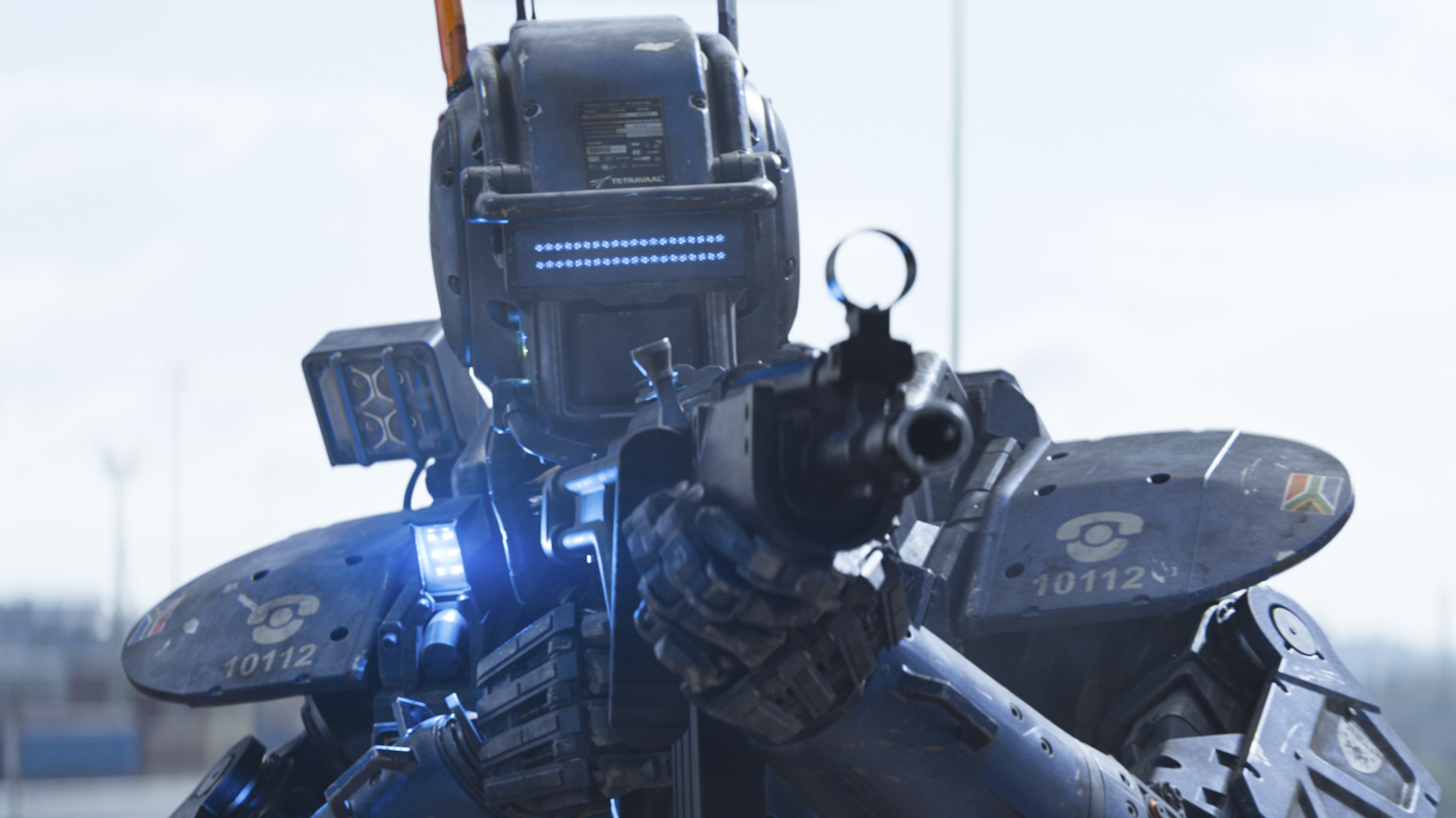 Chappie (pictured above) is a police droid that is reprogrammed to think and feel for himself. (Columbia Pictures)