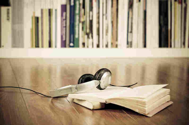 Headphones on top of a book