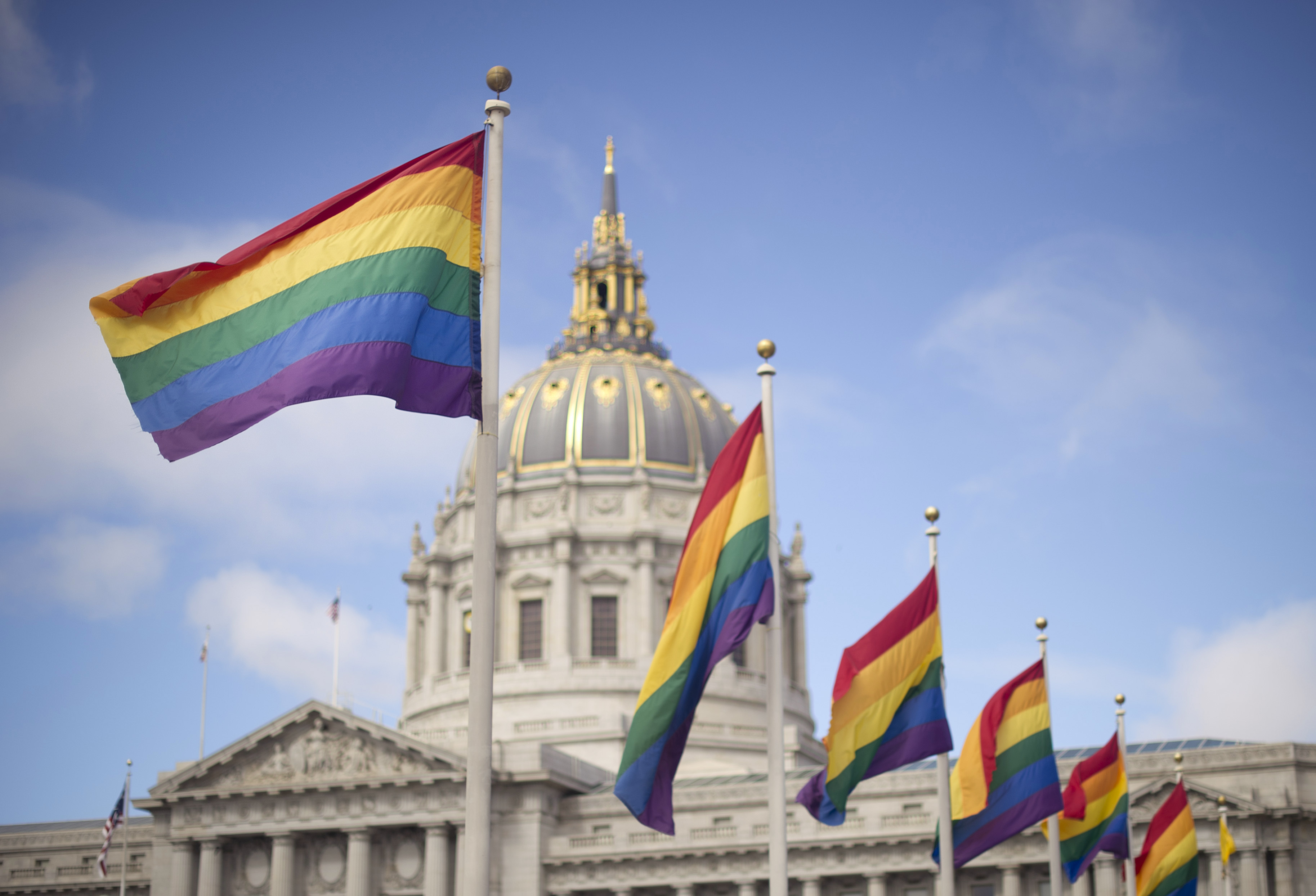 Rainbow flags fly in front of San Francisco City Hall in 2013 after the U.S. Supreme Court cleared the way for same-sex marriage in California.