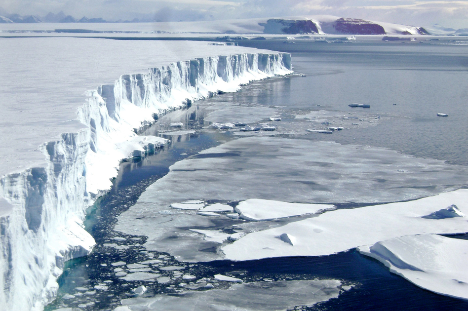 A 2008 view of the leading edge of the Larsen B ice shelf, extending into the northwest part of the Weddell Sea. Huge, floating ice shelves that line the Antarctic coast help hold back sheets of ice that cover land. (Mariano Caravaca /Reuters/Landov)