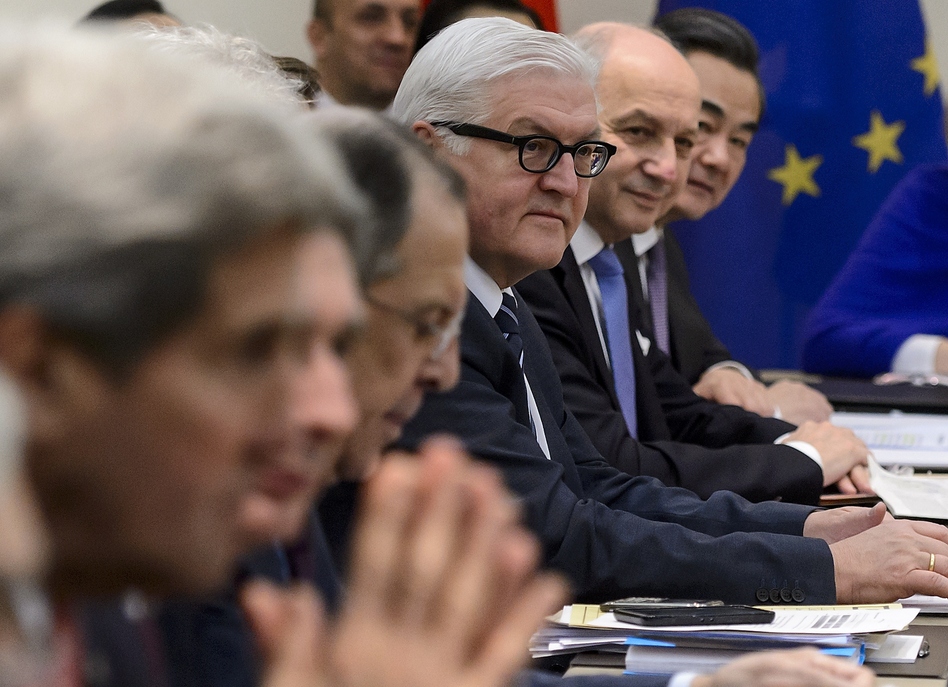 Ahead of Tuesday's deadline, Secretary of State John Kerry, Russian Foreign Minister Sergei Lavrov, German Foreign Minister Frank-Walter Steinmeier, French Foreign Minister Laurent Fabius and Chinese Foreign Minister Wang Yi wait Monday for the opening of a plenary session on Iran's nuclear program at the Beau-Rivage Palace Hotel in Lausanne, Switzerland. (Fabrice Coffrini/AFP/Getty Images)