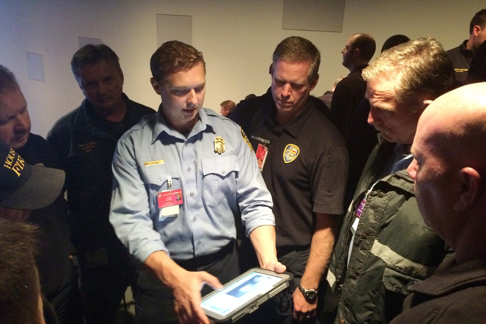 Houston firefighters learn to use a video chat program that will let them consult with an emergency medicine doctor while responding to 911 calls. (Courtesy of Houston Fire Department)