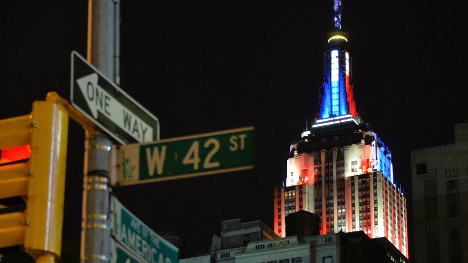 Like the Empire State Building in New York, Clinton's logo is changing appearance to say something about the topics of the day or to tailor to key constituencies. (Mladen Antonov/AFP/Getty Images)