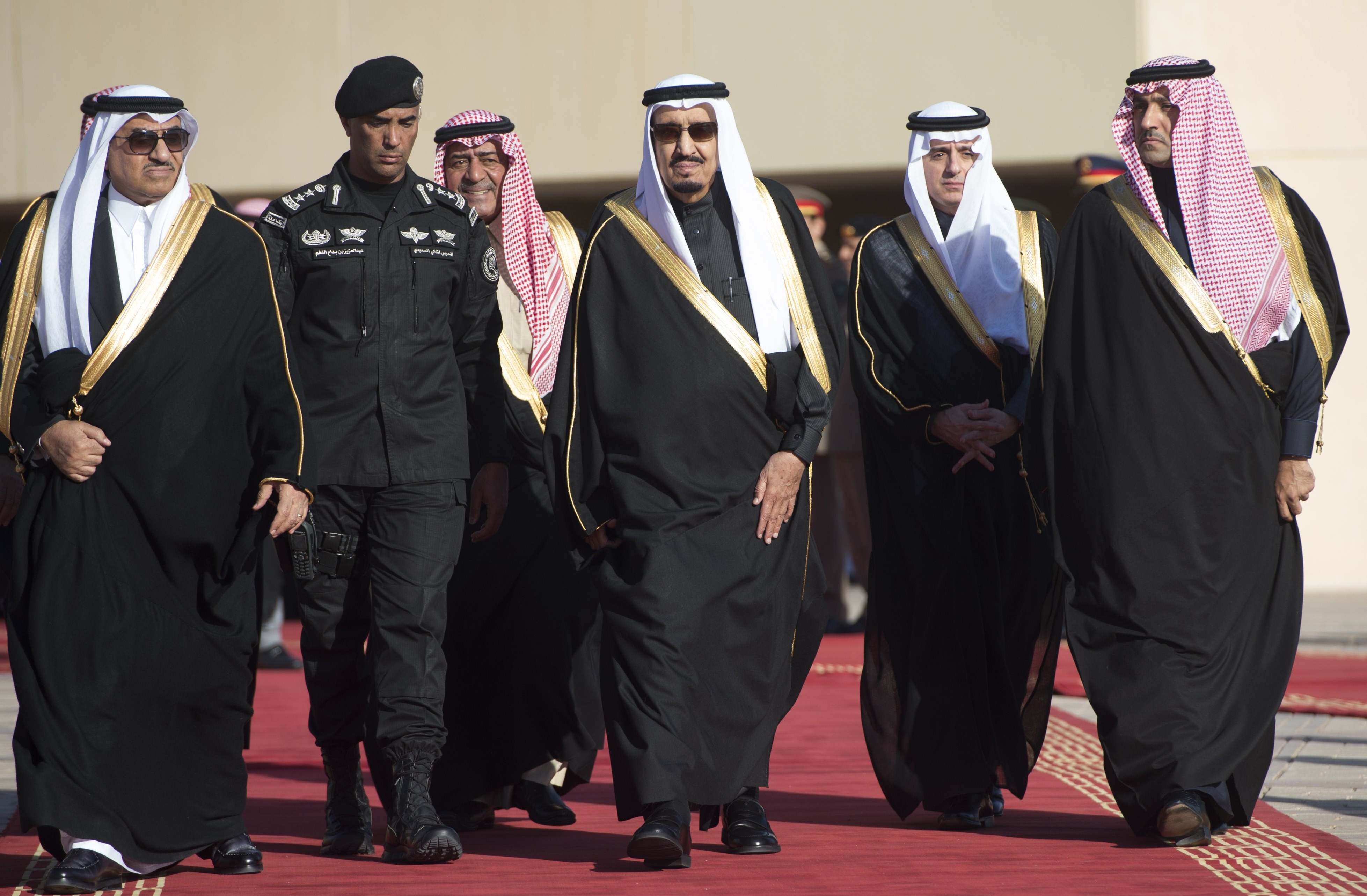 Saudi King Salman (center) appears alongside then-Crown Prince Muqrin bin Abdulaziz (third from left) and then-deputy Crown Prince and Interior Minister Mohammed bin Nayef (left) in January. Muqrin has since been pushed aside to make way for Mohammed. (AFP/Getty Images)