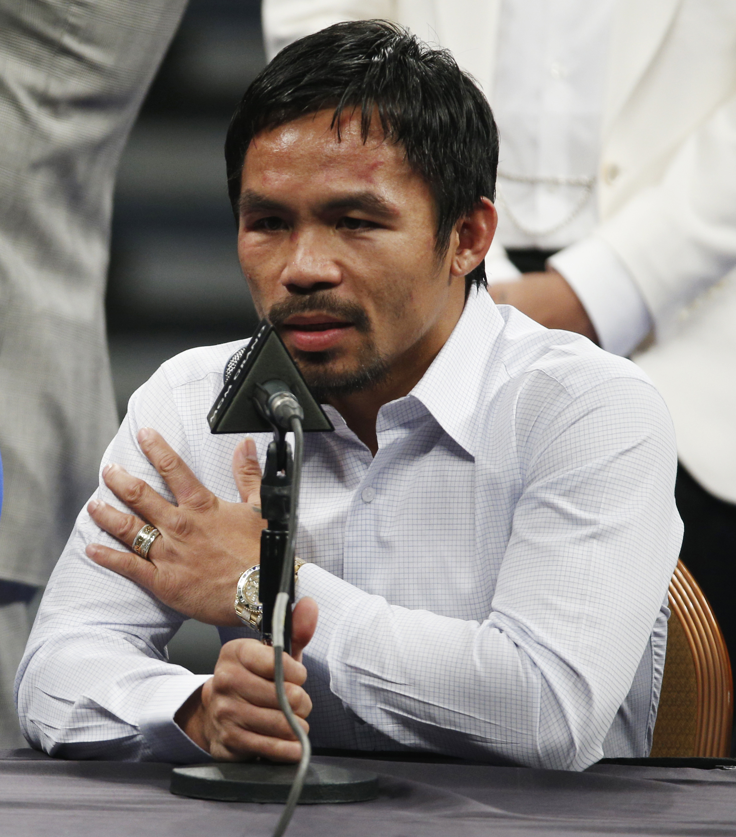 Pacquiao sued for failing to disclose injury before 'Fight of the Century'
