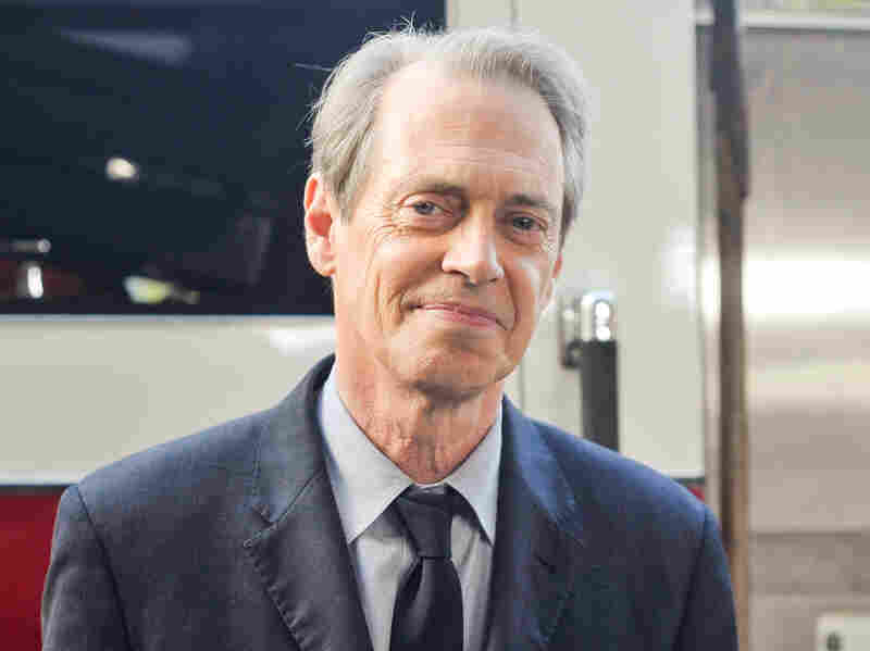 Steve Buscemi poses for photographers during the A Good Job: Stories Of THe FDNY New York premiere on Sept. 4, 2014 in New York City.