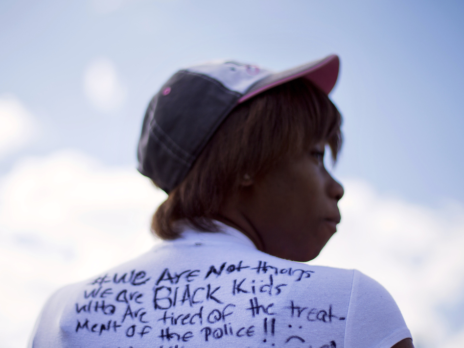 Alize LeGrange, 18, wears a T-shirt she made in response to Baltimore Mayor Stephanie Rawlings-Blake's comments about "thugs" trying to tear down the city on Wednesday, April 29, 2015, in Baltimore. (David Goldman/AP)
