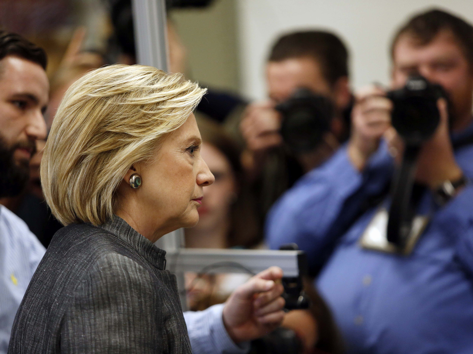 Democratic presidential candidate Hillary Clinton tours a lab during a campaign stop at New Hampshire Technical Institute in April. (Jim Cole/AP)