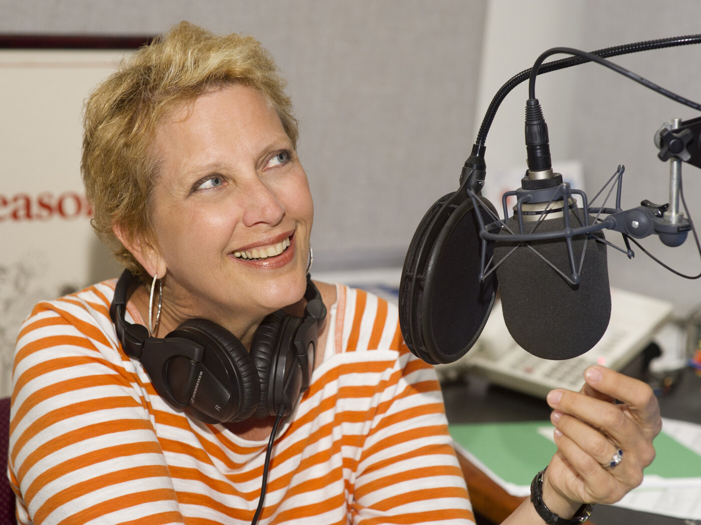 Behind the Met microphone: host Margaret Juntwait, who died Wednesday at age 58.