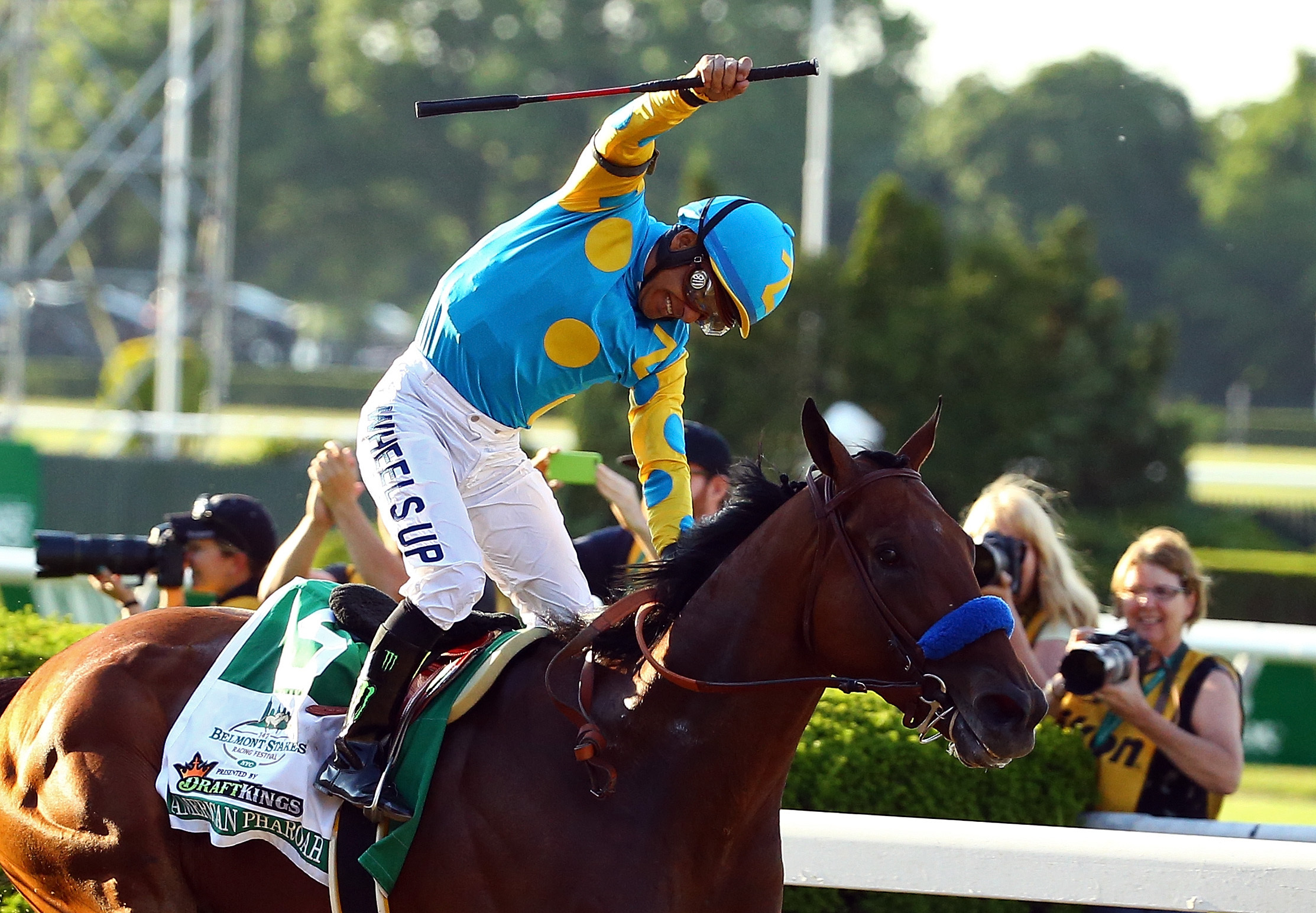Victor Espinoza celebrates atop American Pharoah after winning the 147th running of the Belmont Stakes at Belmont Park on June 6 — the first Triple Crown win since 1978. (Getty Images)