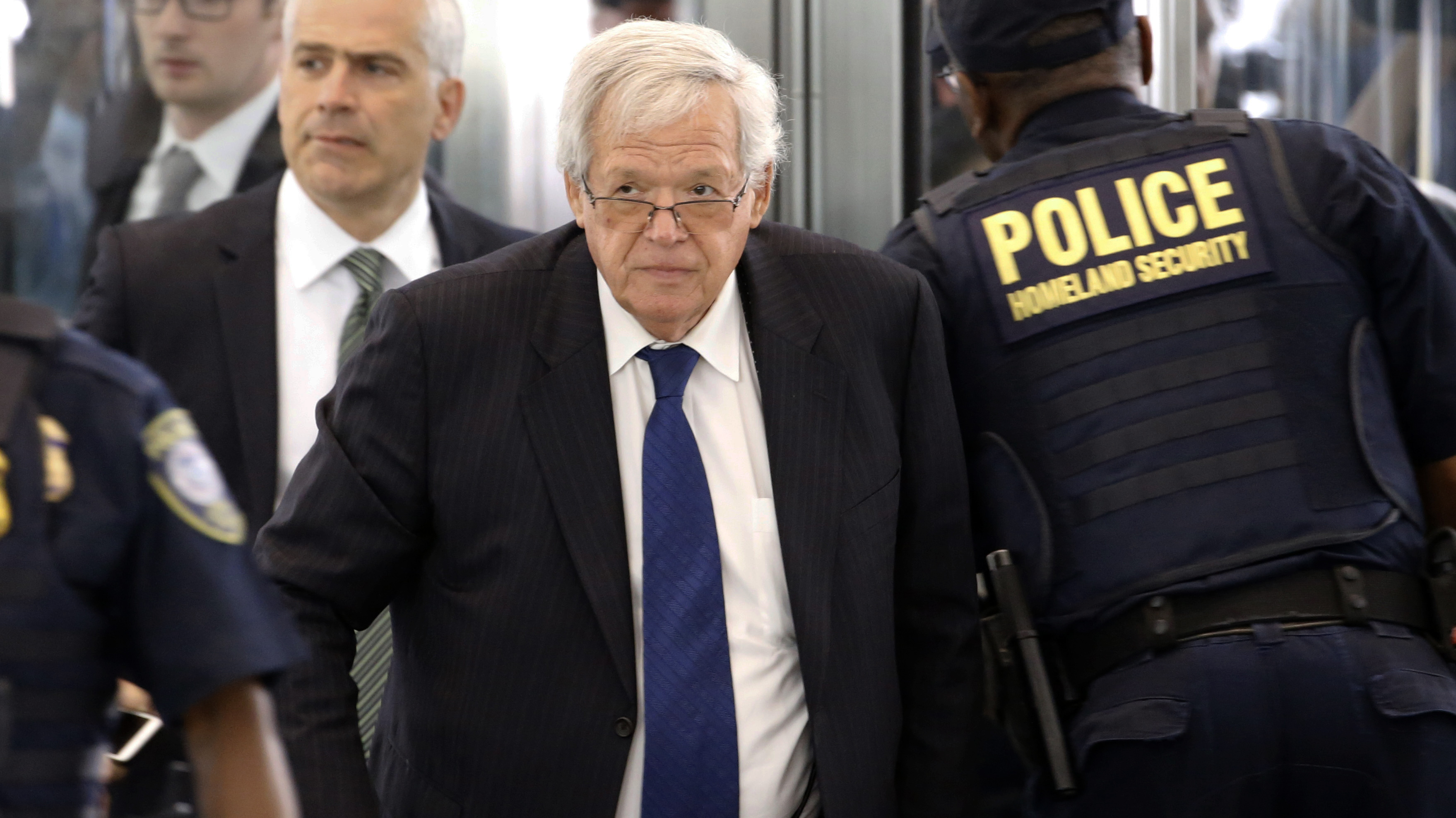 Former House Speaker Dennis Hastert arrives at the federal courthouse for his arraignment. He is accused of crimes allegedly arising from an attempt to pay $3.5 million to someone from his days as a high school teacher not to reveal a secret about past misconduct.