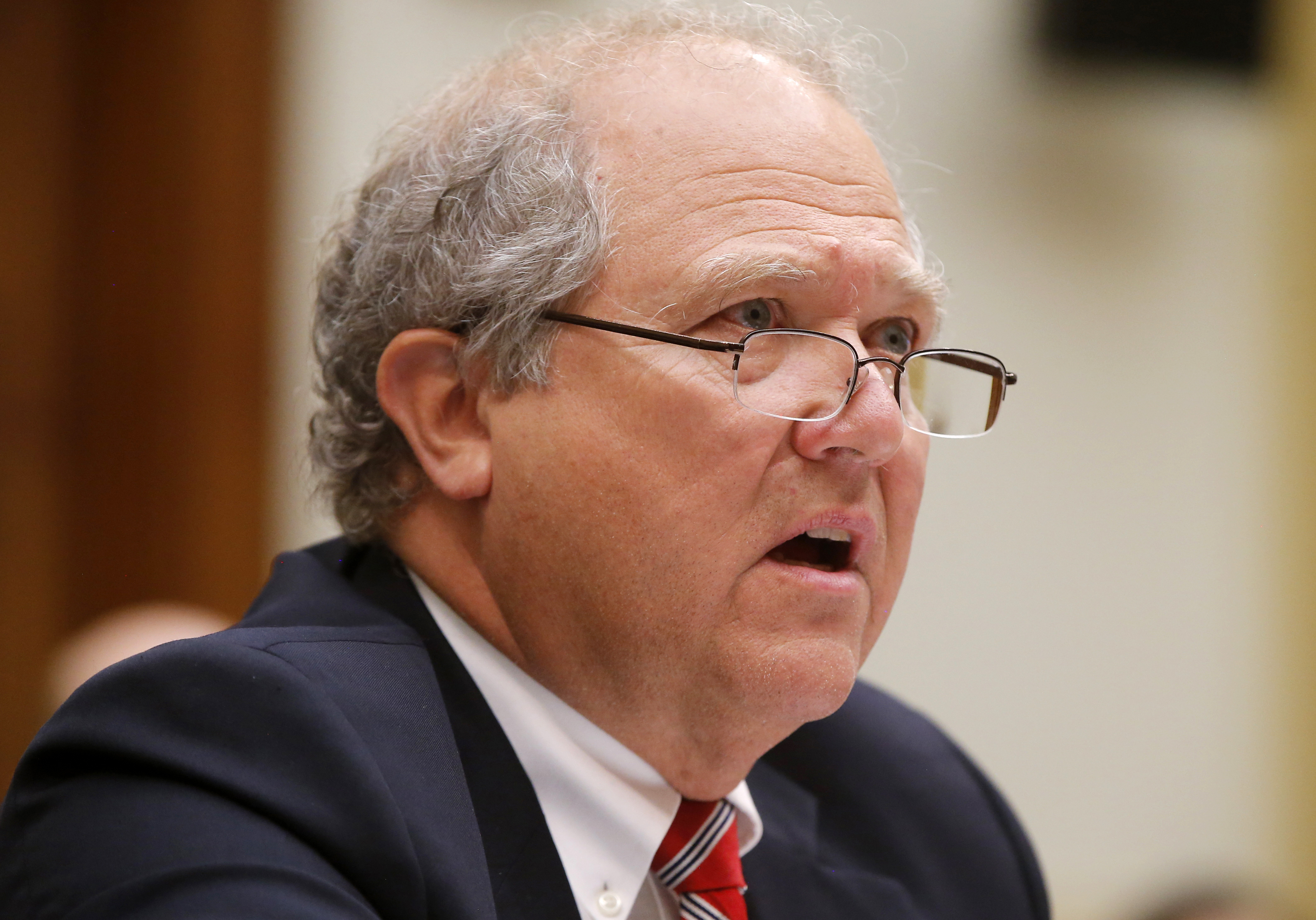 John Sopko, special inspector general for Afghanistan reconstruction, testifies on Capitol Hill last June. In a letter released Thursday, Sopko says the U.S. may have been paying for "ghost schools, ghost students and ghost teachers" in Afghanistan.