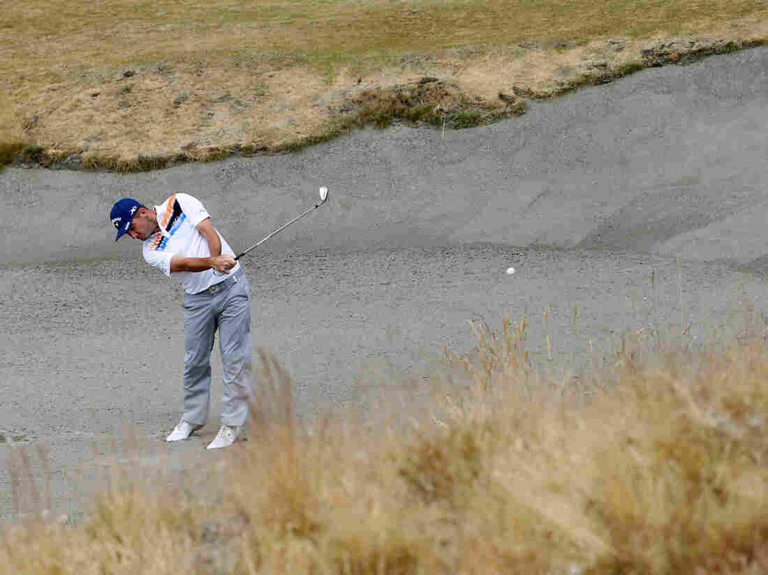 Matt Every hits out of the bunker on the seventh hole during the first round of the U.S. Open golf tournament at Chambers Bay.