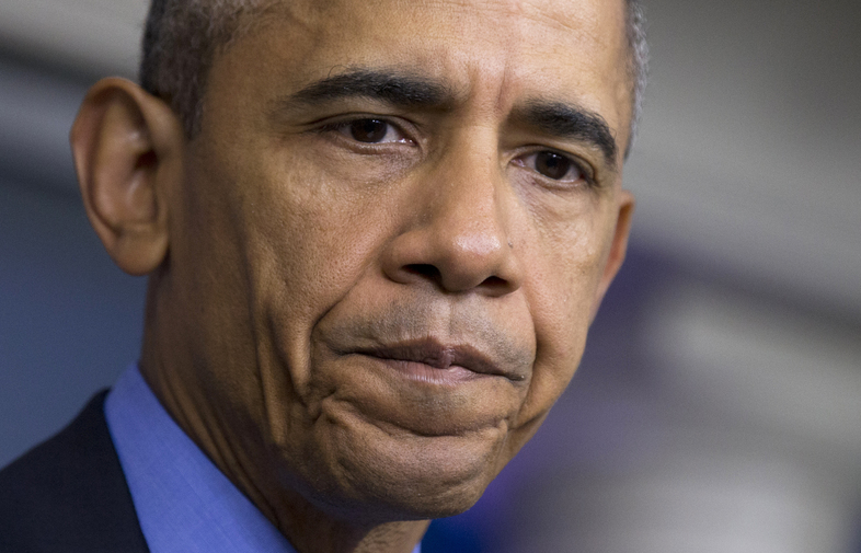 President Obama pauses while speaking in the White House Briefing Room about the church shooting in Charleston, S.C. (Manuel Balce Ceneta/AP)