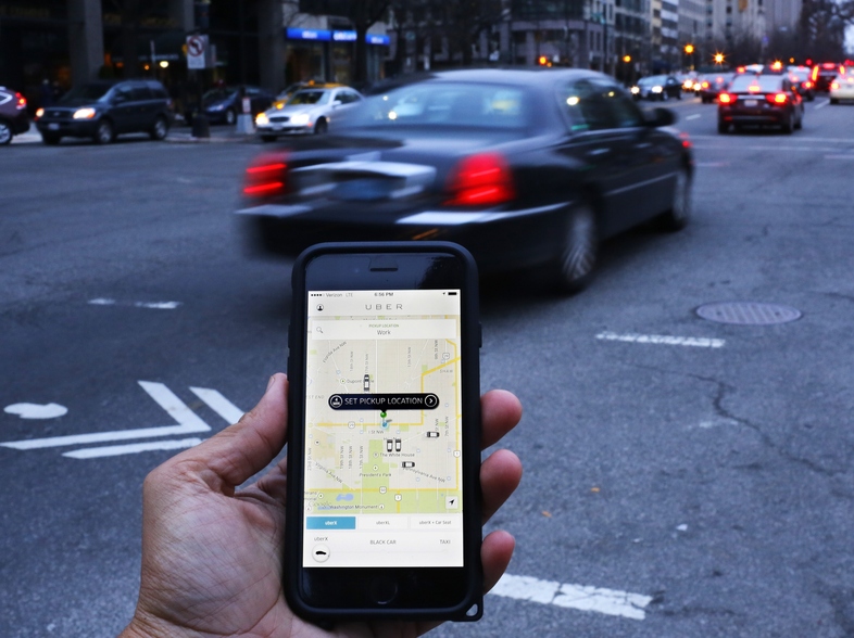 Uber drivers can chose their own hours, and decide whether or not to pick someone up. (Andrew Caballero-Reynolds/AFP/Getty Images)