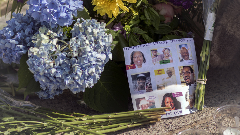 Flowers line the sidewalk in front of the Emanuel AME Church in Charleston, S.C. (Stephen B. Morton/AP)