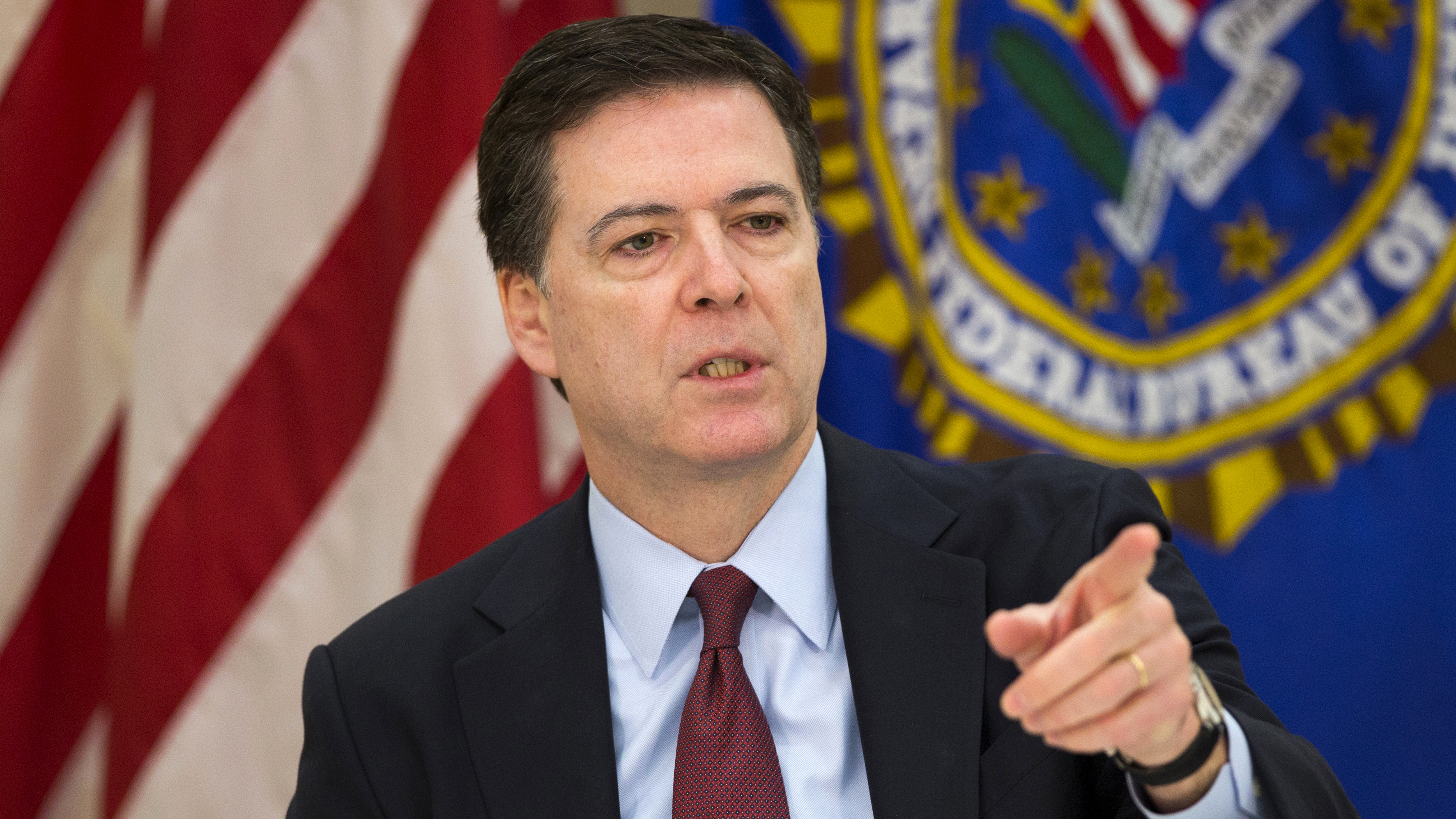 FBI Director James Comey speaks at FBI headquarters in Washington.