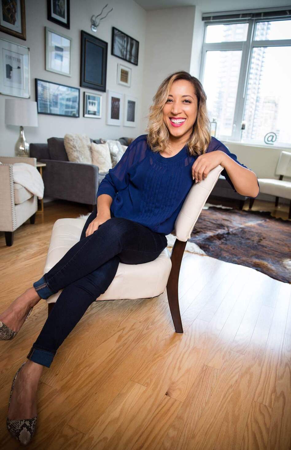 Robin Thede is head writer for Comedy Central's <em>The Nightly Show with Larry Wilmore</em>. She's previously been a reporter for E! News, a writer for BET's <em>Real Husbands of Hollywood</em> and head writer for <em>The Queen Latifah Show</em>. (Jaxonphotogroup/Courtesy of Robin Thede)
