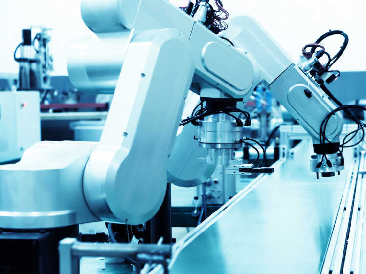 Modern automatic robot assembly line in a factory.