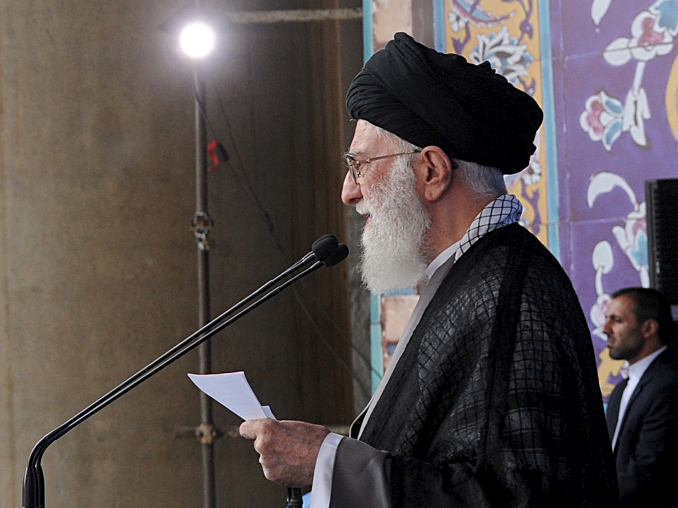 Iran's Supreme Leader Ayatollah Ali Khamenei delivers a sermon during morning prayers for the Eid al-Fitr holiday, marking the end of the holy month of Ramadan. He signaled his approval of the nuclear agreement with Western powers but reiterated that Tehran's policy toward the "arrogant" United States would not change.
