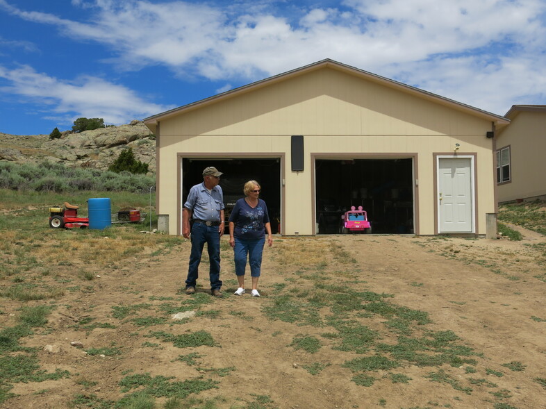 Jim and Lyn Schneider installed solar panels and batteries because bringing grid power to their house in central Wyoming was going to cost around $80,000. (Leigh Paterson/Wyoming Public Radio)