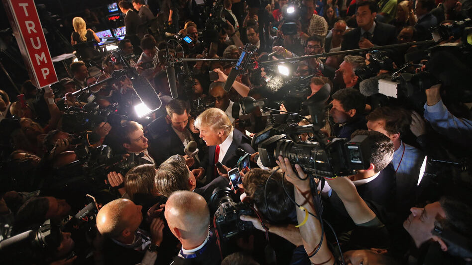 Donald Trump talks to reporters after Thursday's debate. (Scott Olson/Getty Images)