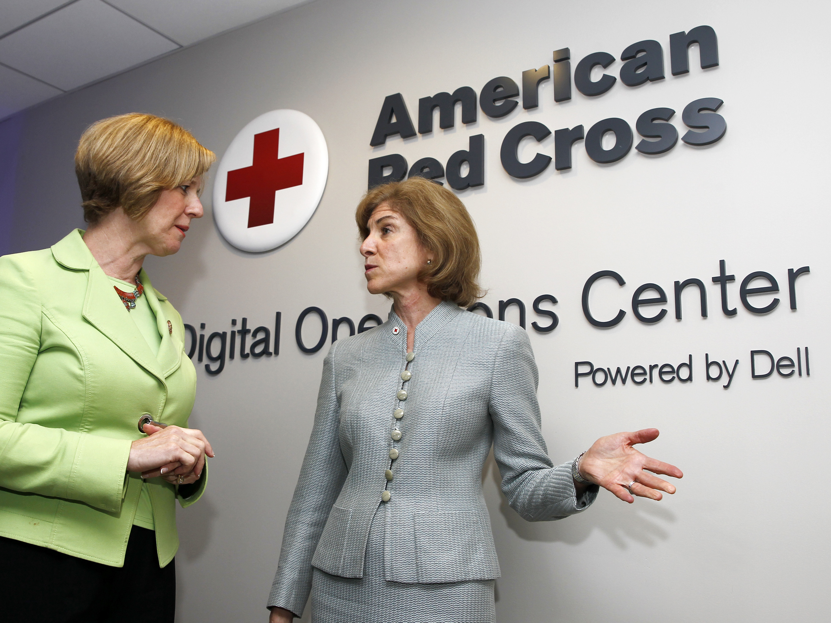 American Red Cross chief Gail McGovern (right) and Rep. Susan Brooks of Indiana tour the American Red Cross Digital Operations Center last year in Washington, D.C.