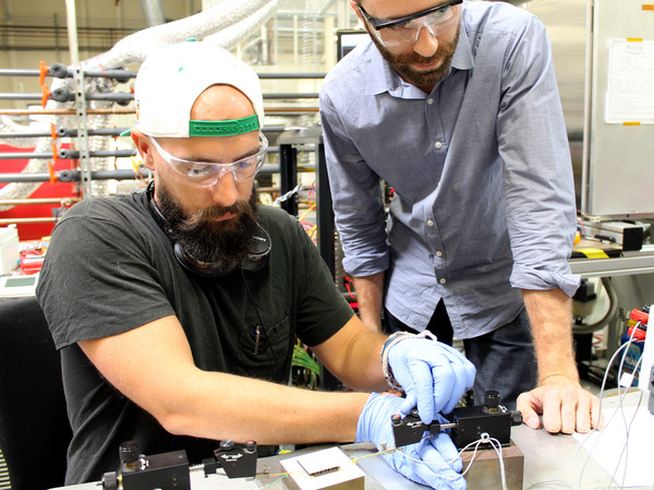 Jordan Chase (left), Alphabet Energy's lead engineer, and CEO Matt Scullin measure PowerCard properties in the company's lab in Hayward, Calif.