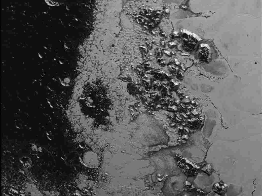 Mountain range near the southwestern margin of Pluto's now-famous heart-shaped Tombaugh Region.