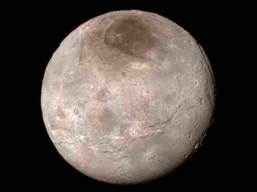 Pluto's largest moon, Charon, revealed from a distance of 289,000 miles.